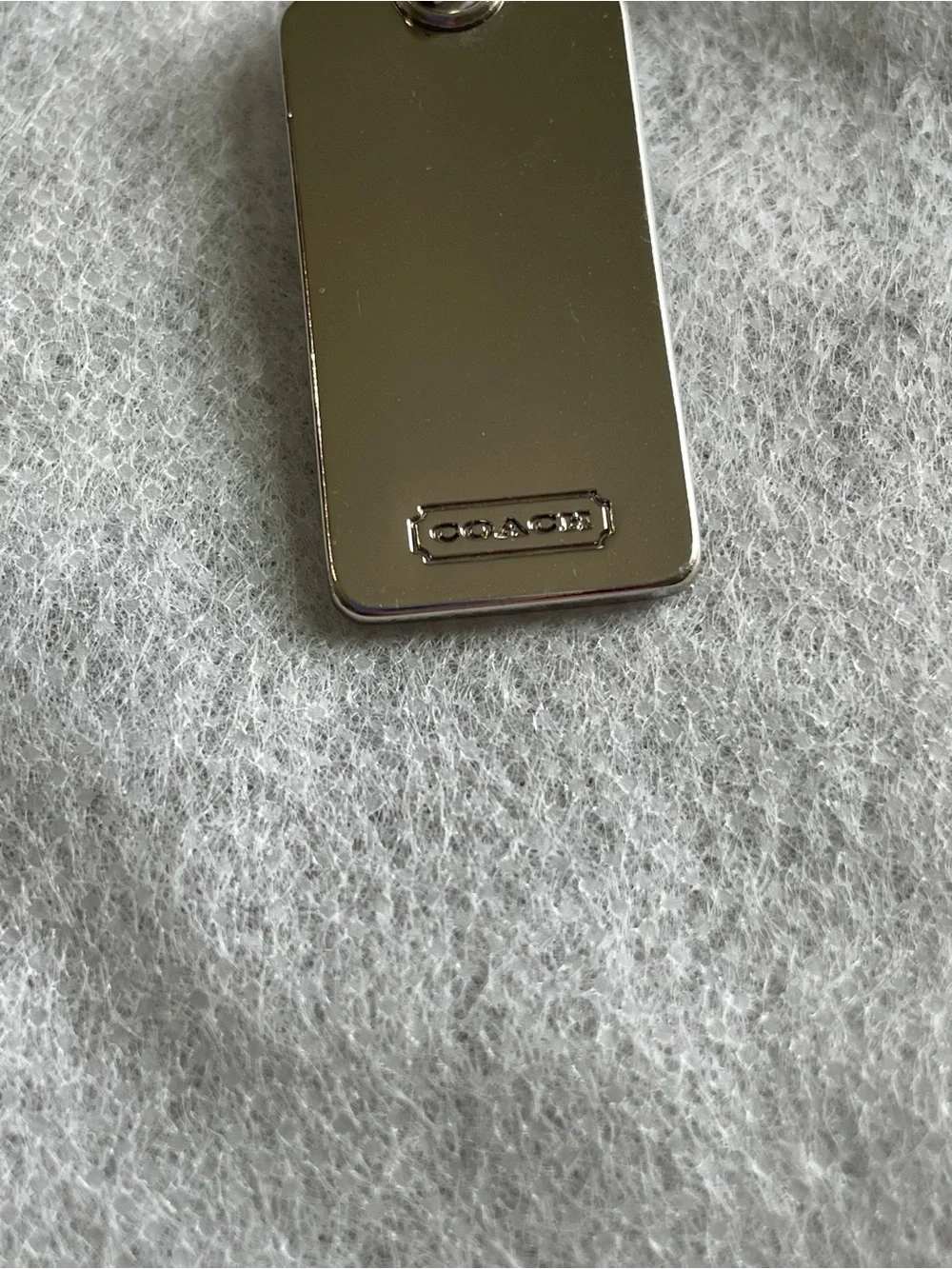 Coach Silver Tone Logo Tag Charm